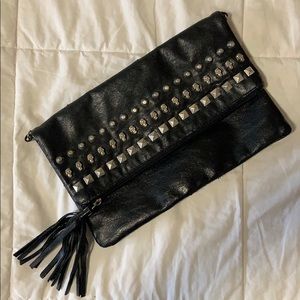 Black and silver studded skull clutch